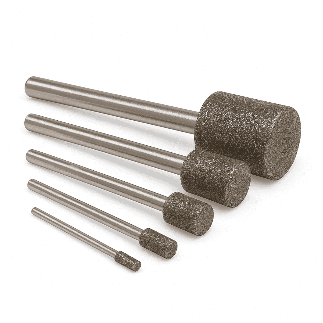Assortment of five different sizes of large diamond cylinder burrs for grinding and shaping stone, glass, and ceramics.