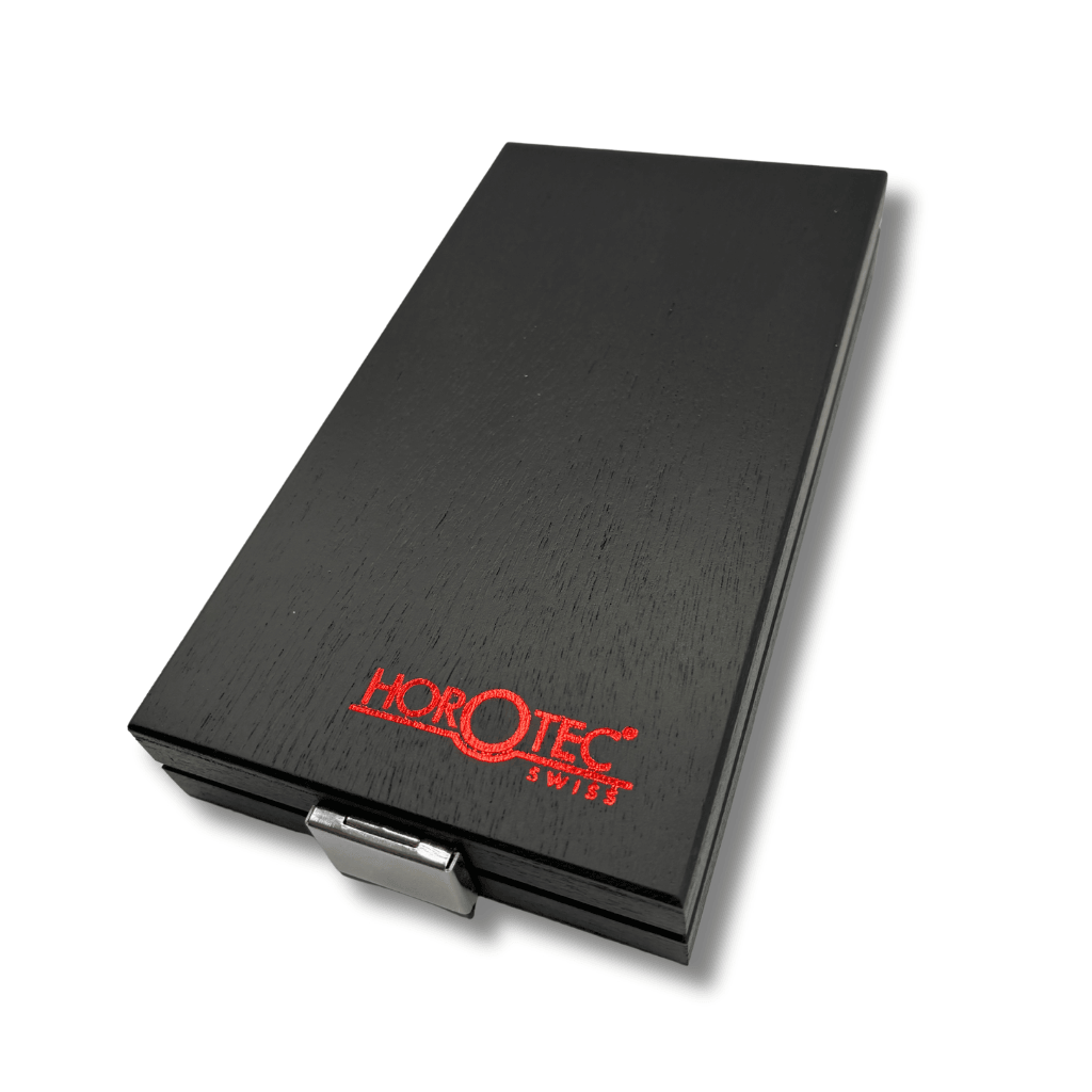 Black rectangular wooden box with red 'Horotec Swiss' logo holds four Horotec tweezers