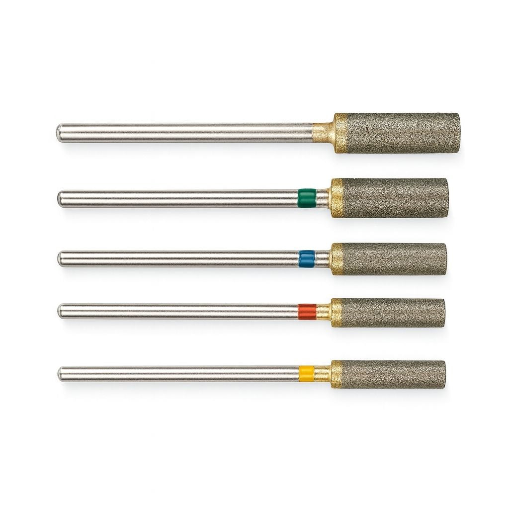 Five sintered diamond cylinder burrs in sizes ranging from 3mm to 6mm and in different grits from oarse to extra fine.