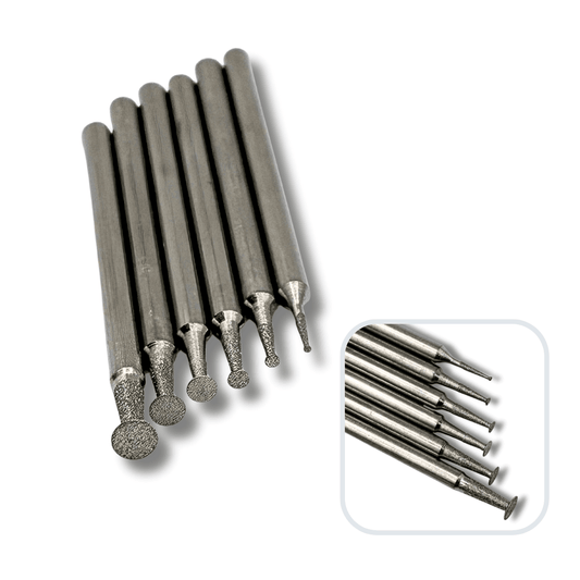 assortment of six small diamond disc burrs with a 2.35mm shank for engraving and carving glass and stone. Also a close up, side view image of the discs