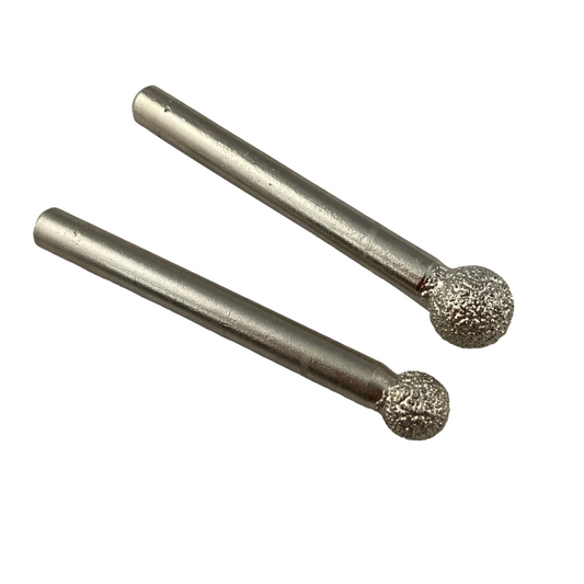 Two vacuum brazed diamond ball burrs designed for cutting and shaping with a ball-shaped diamond point, mounted on a 6mm shank.
