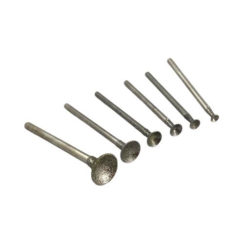 An assortment of six different sizes of Diamond bead shaping burrs for carving a bead or carving a circle shape in stone or glass
