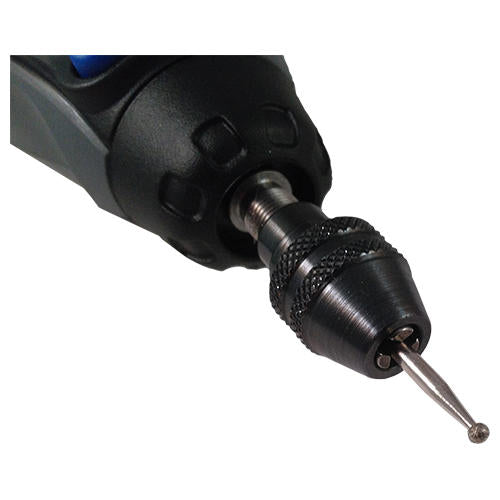 Diamond ball burr in Dremel rotary tool for engraving glass.