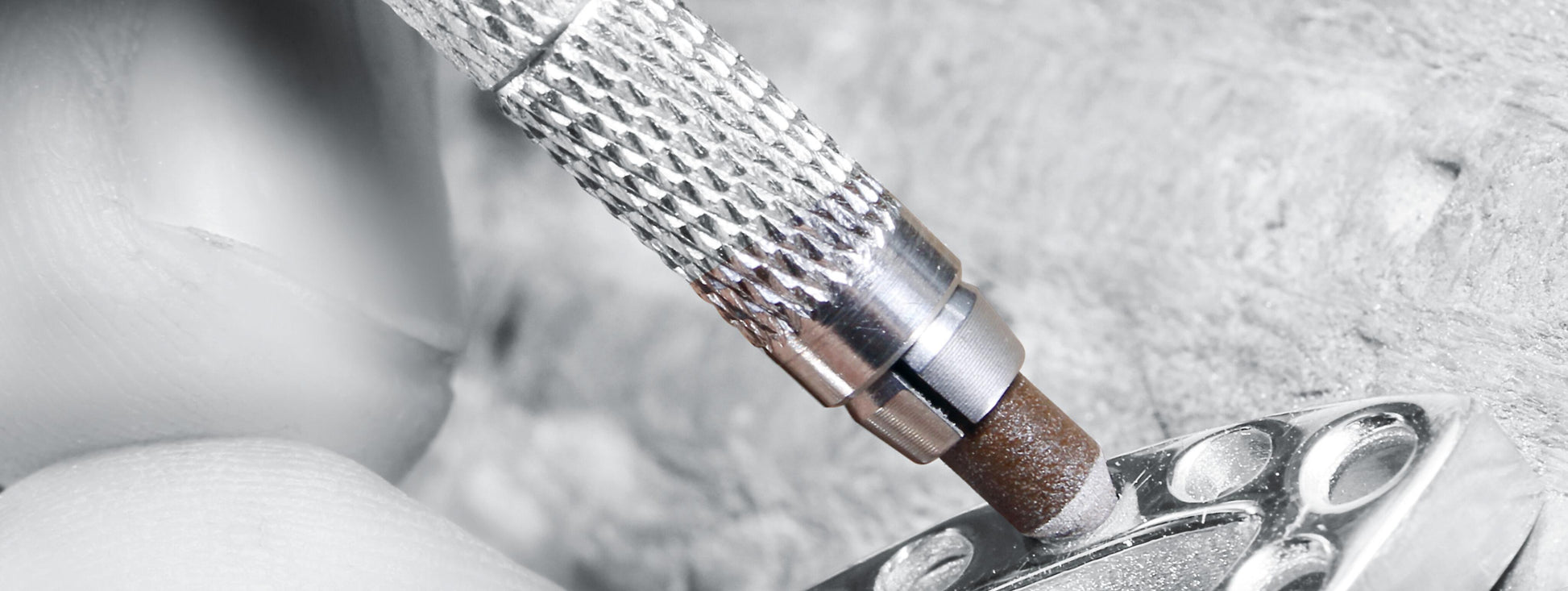 Silicone rubber pin polishers polishing a silver setting