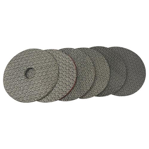 Six diamond Grinding and Polishing Pads showing the diamond abrasive backing