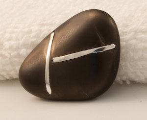 Beach Pebble with Inlaid silver by Pianeta Jewellery