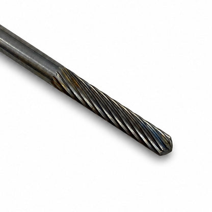 A close-up of a metal carbide rotary burr bit with a single-cut twisted flute cutting edge, round nose cylinder shown diagonally on a plain white background.