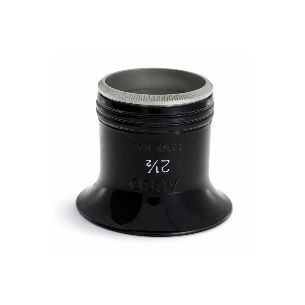 Swiss made Type H, ASCO eye loupe with a blue-tinted lens. 2.5x magnification