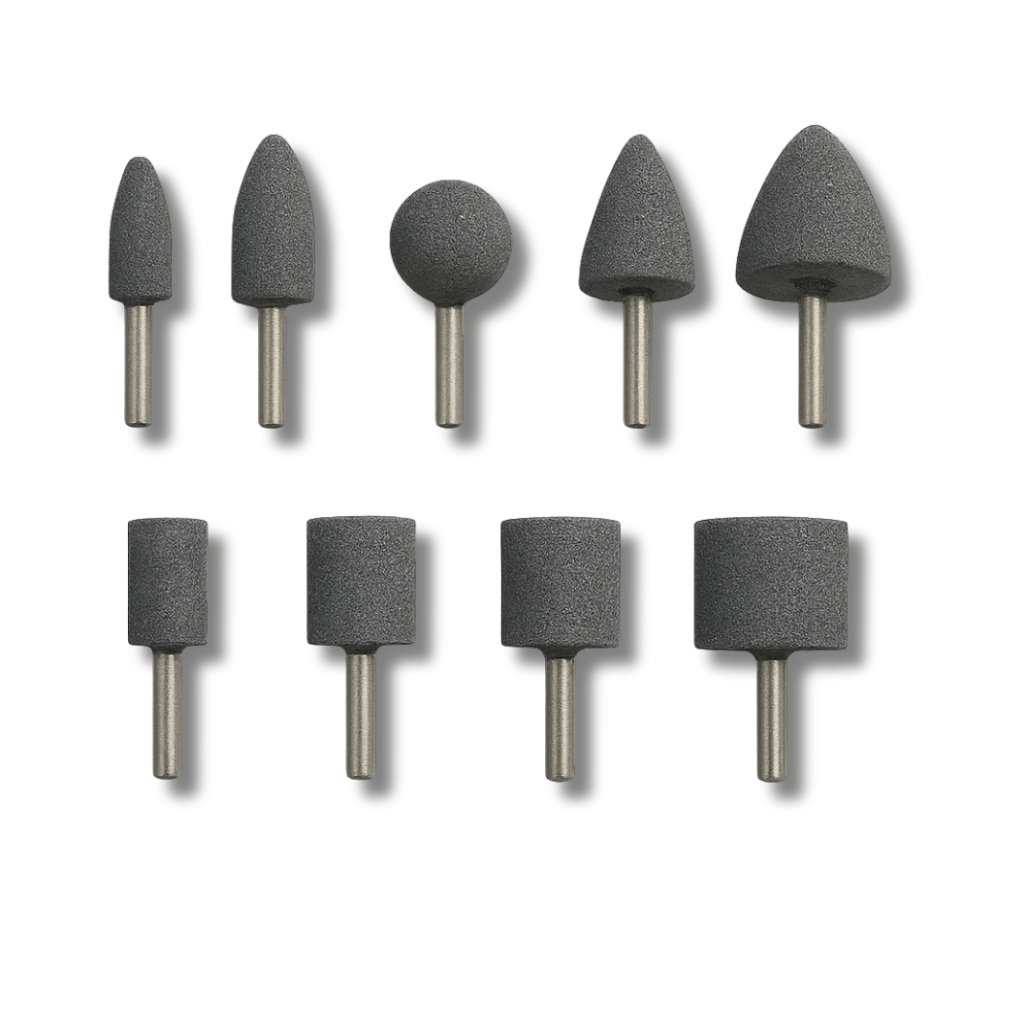 Nine assorted shapes of mounted, grey aluminium oxide corundum grinding stone points on a whote background