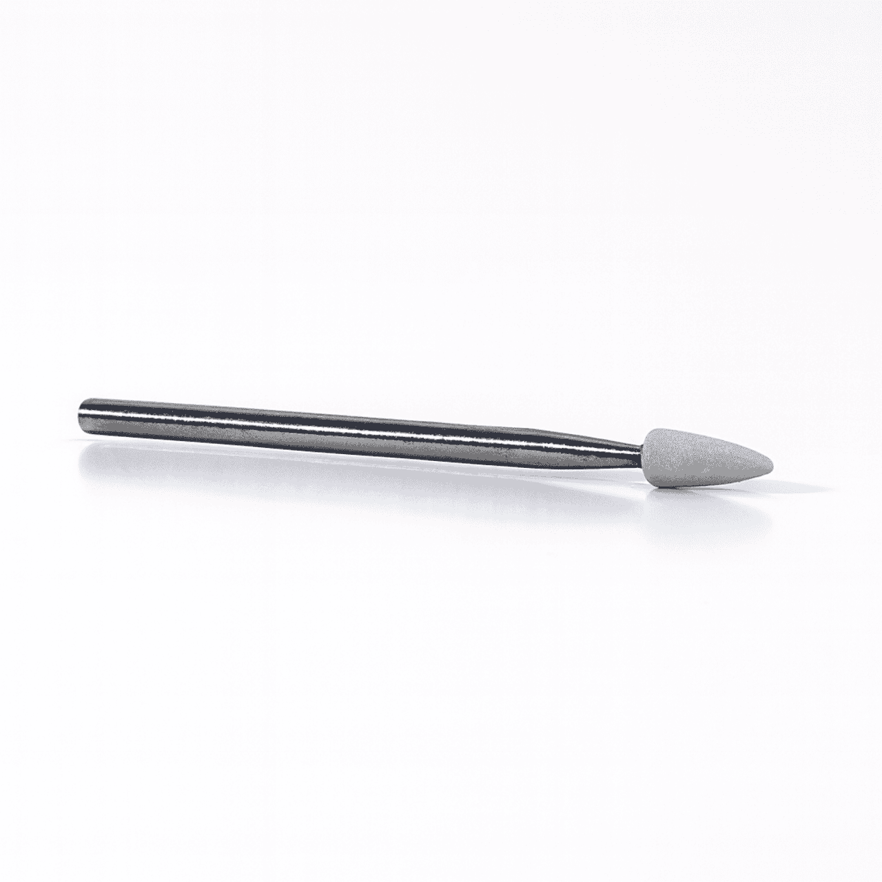 White Bullet shaped Arkansas Stone Bur mounted on a steel shank