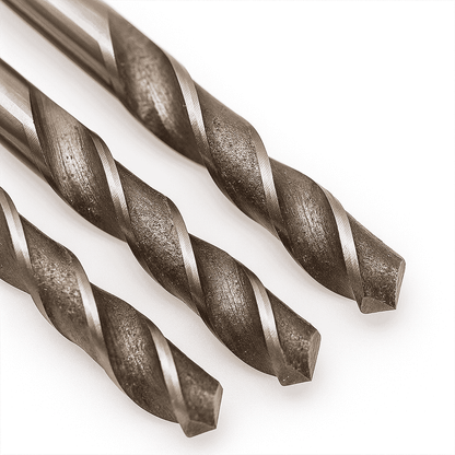 Close-up of three high speed steel drill bits on a white background