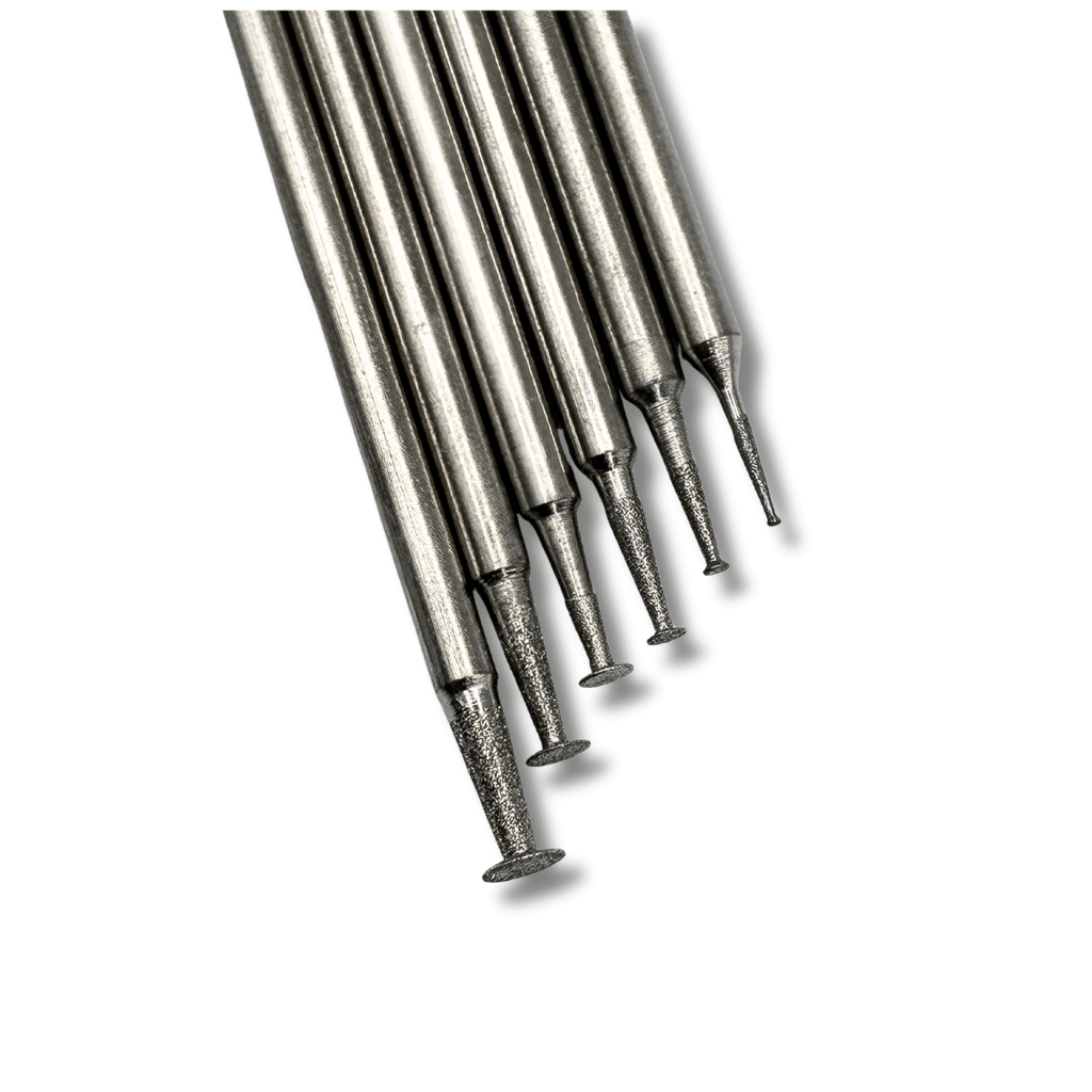close up top view of six small diamond disc burrs with a 2.35mm shank for engraving and carving glass, stone and gemstones