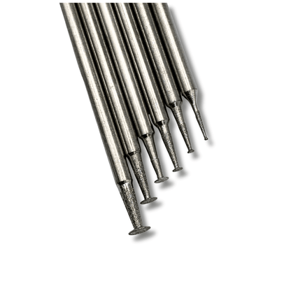close up top view of six small diamond disc burrs with a 2.35mm shank for engraving and carving glass, stone and gemstones