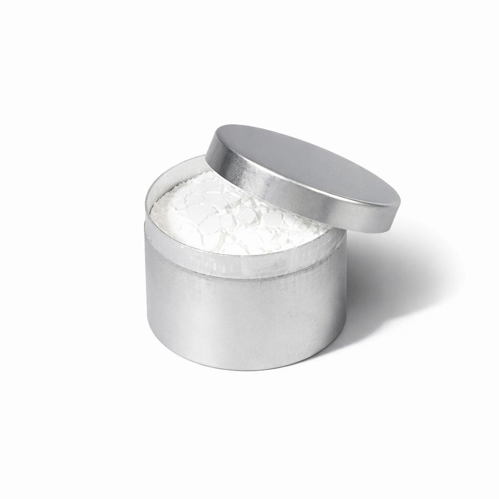 Diamantine white Polishing Powder in a 60g silver metal container tin with a lid on a white background
