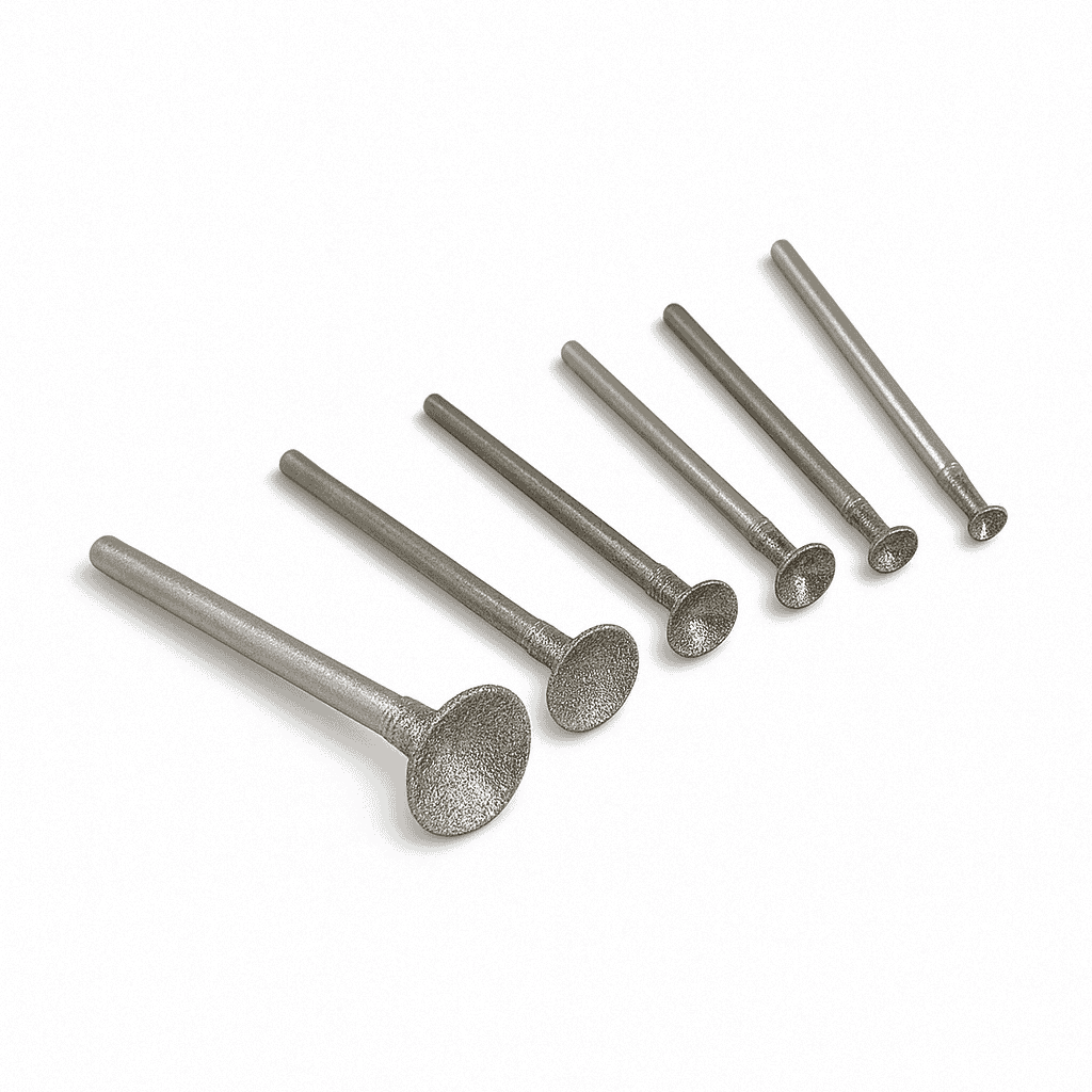 An assortment of six different sizes of Diamond bead shaping burrs for carving a bead or carving a circle shape in stone or glass