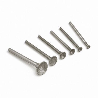 An assortment of six different sizes of Diamond bead shaping burrs for carving a bead or carving a circle shape in stone or glass