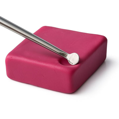 Double Ended Stainless Steel Carving tool on pink modelling clay