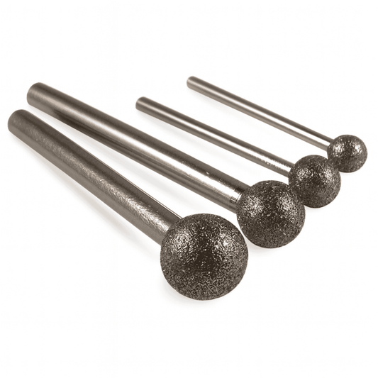 An assortment of four Large Diamond Ball Burrs mounted on a steel shank. sizes 4mm to 50mm.