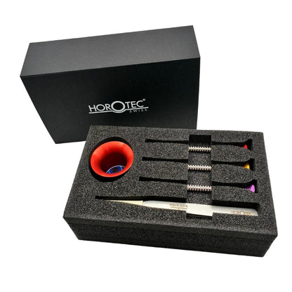 Horotec Professional Watchmakers Kit in presentation box on a white background. showing an eyeglass, three screwdrivers and some tweezers