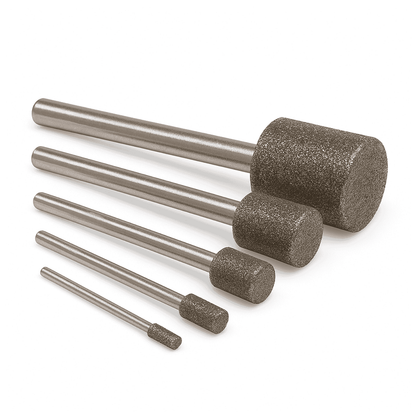 Assortment of five different sizes of large diamond cylinder burrs for grinding and shaping stone, glass, and ceramics. 