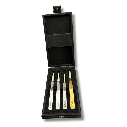 Horotec Watchmakers Tweezers Set in a wooden display Box.showing four tweezers in sizes 2, 3, 5 and AM